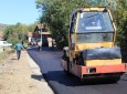 РЕХАБИЛИТАЦИЈА КОЛОВОЗА У КОНОПНИЦИ И УГРАДЊА ГРЕБАНОГ АСФАЛТА У ОРАШЈУ